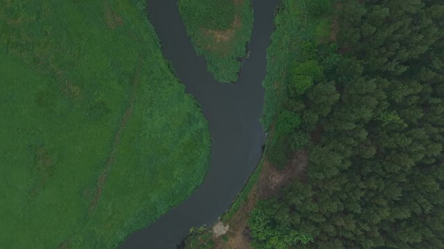 River Confluence &ndash; High Top Down Wide Aerial Flight Through Cloud Layer