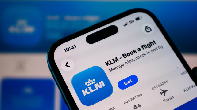 Closeup of a smartphone screen displaying the klm royal dutch airlines mobile application page on the apple app store