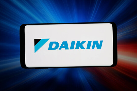Stuttgart, Germany - 06-02-2026: In this photo illustration, the logo of Japanese company Daikin Industries Ltd. is displayed on a smartphone in front of abstract background on computer screen.
