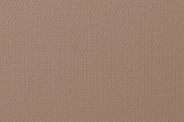 Fototapeta premium Textured brown canvas background with a subtle woven pattern.