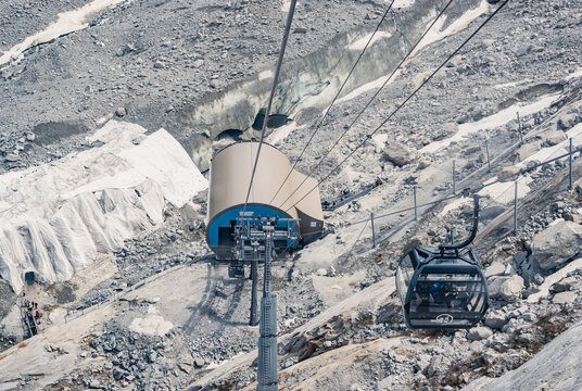 Gondola cable car above Mer de Glace glacier in Chamonix, French Alps