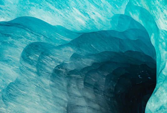 Abstract blue glacier ice formations inside Mer de Glace ice cave, France