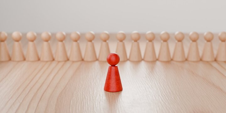 3d wooden pawn figurines in a line being one highlighted in red, spotlight, stage, public speaking, speech