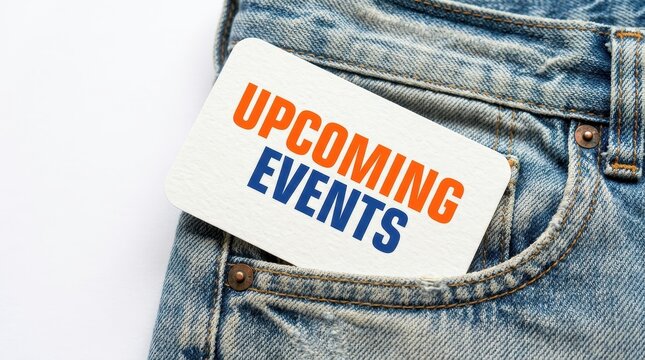 Upcoming events card in jeans pocket isolated on white background