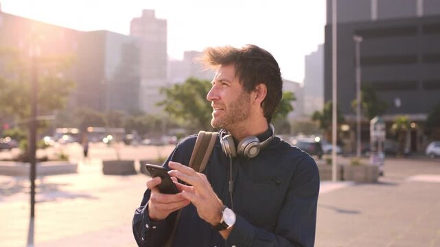Search, reading or businessman with phone in city, digital map or navigation app for apartment location. Online directions, destination finder or realtor with tech for travel assistance, town or wind