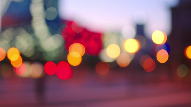 Bokeh, blur or people with city lights, traffic or night of urban street, buildings or destination. Location, glow or metro view with crowd in evening of defocused motion, busy road or downtown