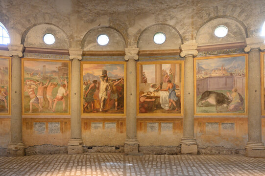 Basilica of Santo Stefano Rotondo on the Caelian Hill in Rome, Italy. Circular nave walls decorated with Renaissance martyrdom frescoes