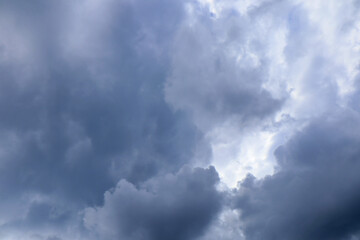 Fototapeta premium Dark heavy clouds before a thunderstorm. Natural sky background. Copy space