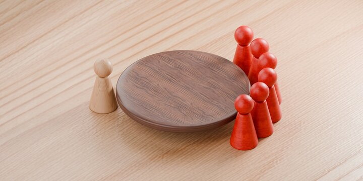 pawn figurines standing round a table, with one pawn highlighted in red. Corporate work environment, meeting, interview