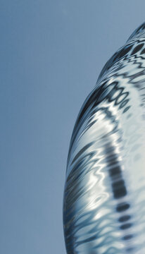 Abstract close-up of a drop surface ripple reflection