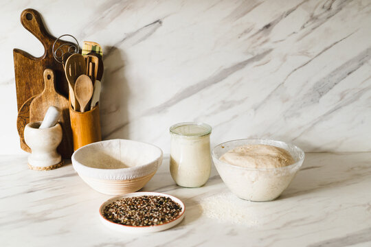 Rustic kitchen scene with sourdough essentials