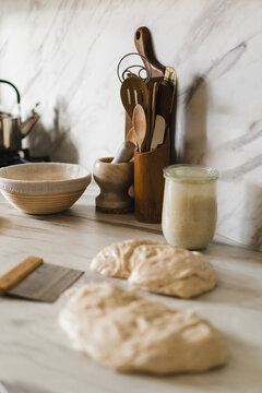 Artisan sourdough bread dough and kitchen tools