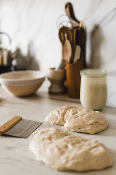 Homemade sourdough bread dough on a kitchen counter