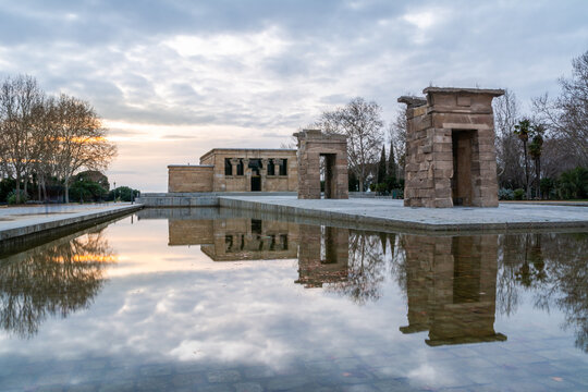 Temple of Debod at sunset with tranquil reflections