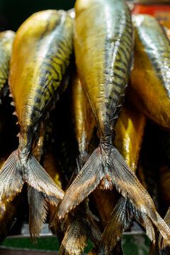 Smoked mackerel tails at an Uzbekistan market food stall