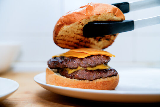 Homemade double cheeseburger with melted cheese