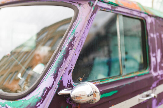 Vintage purple truck with weathered exterior
