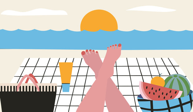 Person relaxes on the beach, surrounded by fruit.
