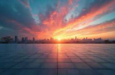 Obraz premium Vast stone patio faces city skyline at sunrise. Colorful clouds fill the sky. Buildings and trees form urban landscape background. Sun appears over horizon.