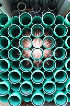 Colorful Stacked Plastic Pipes in Circular Arrangement
