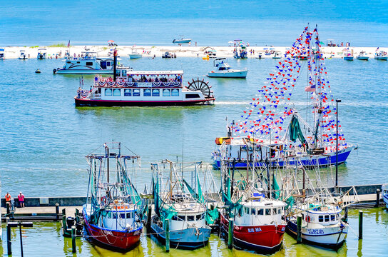 Kenny B shrimp boat and Betsy Ann riverboat at 92nd annual Blessing of the Fleet in Biloxi Mississippi