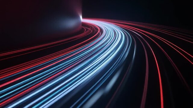 A streak of colorful light trails curve through a dark urban environment at night.