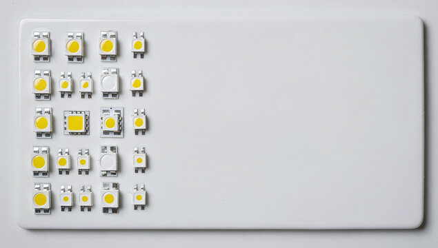 SMD LED diode components patterns organized on white surface background