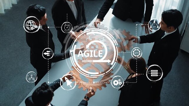 A professional team engages in strategic planning, utilizing visual technology to enhance their agile project management approach in a modern office environment. Raster