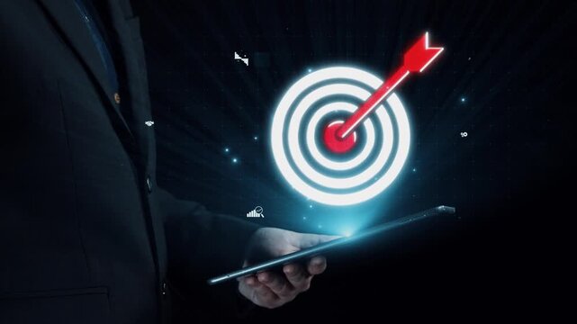 A professional figure holds a tablet with a digital target graphic, symbolizing business success through data analysis and strategic planning with engaging icons. Qubit