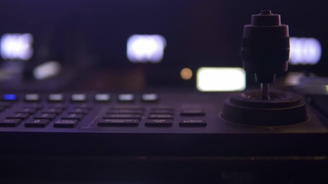 Professional camera crane joystick controller in a broadcast studio