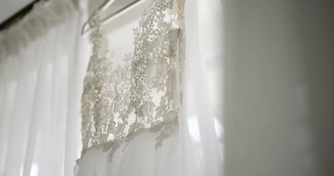 Sheer lace curtain glowing in soft daylight