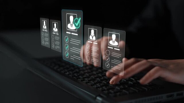 Hands typing on keyboard with digital interface displaying profile cards and selection checkmarks in a dark environment Sigmoid