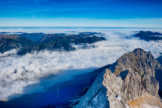 Zugspitze Summit Views Above Cloudy Alpine Peaks