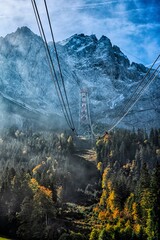 Zugspitze Cable Car Through Misty Alpine Forest © digidreamgrafix