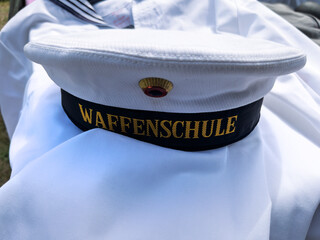 Obraz premium German Military Cap with Waffenschule Insignia