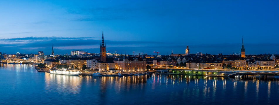 Stockholm Skyline Reflections Across Blue Hour Waterfront