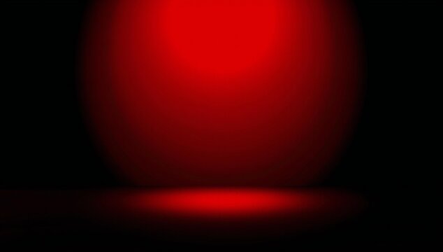 Glowing red orb in darkness