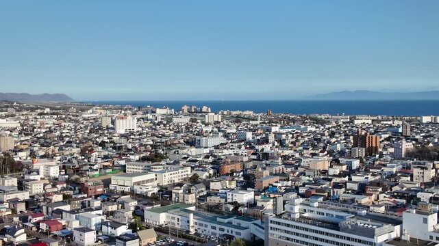 HAKODATE, JAPAN. Coastal cityscape with port and surrounding hills April 25 2026