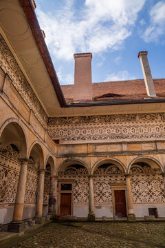 Renaissance sgraffito decoration gracing Nelahozeves Castle courtyard arcade