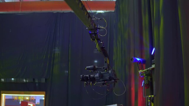 Professional broadcast camera crane filming live event