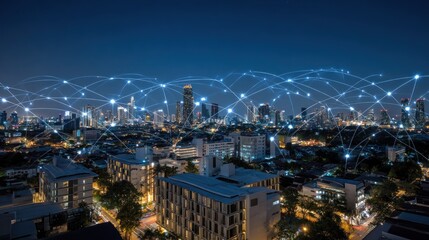 Obraz premium Illuminated urban skyline at twilight features an abstract digital network overlay connecting different points.