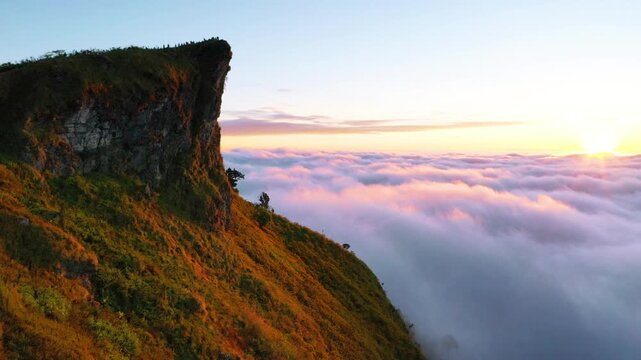 Sunrise and Mist mountain in Phu Chi Fa located in Chiang Rai, Thailand. Phu Chi Fa is the natural border between Thailand and Laos.
