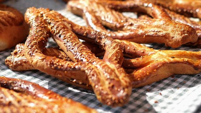 Freshly baked pretzels at a local market stand