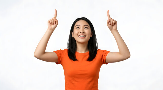 Young Asian woman smiling and pointing upwards with both index fingers, indicating a direction or highlighting something above PNG Isolated on transparent background
