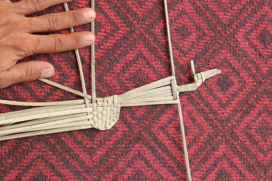 The process of making suket puppets, which are made from a type of grass called mendong