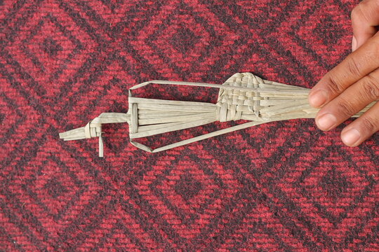 The process of making suket puppets, which are made from a type of grass called mendong