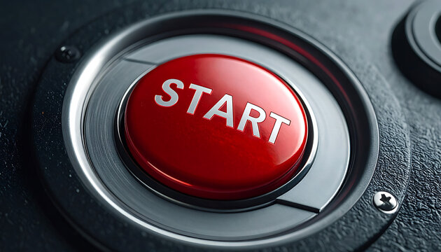 closeup of a red start button on a metallic surface, representing beginning, action, and initiation