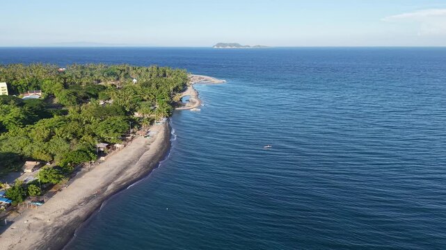 Aerial Drone, Rising Over Palm Coast Village and Apo Island, Philippines, 4K
