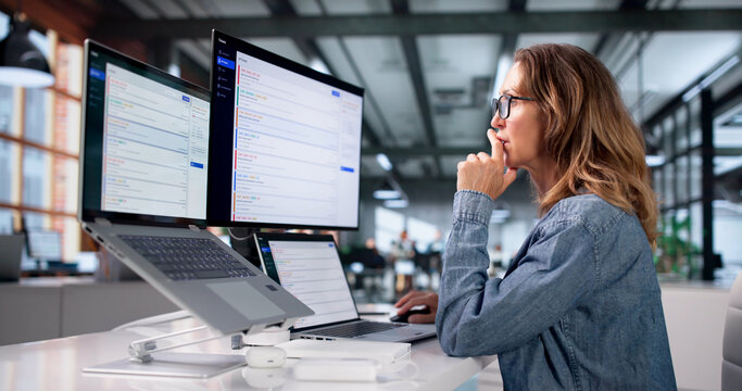 Experienced Woman Working On Laptop