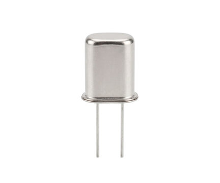 Quartz crystal oscillator isolated on white background high resolution studio shot.